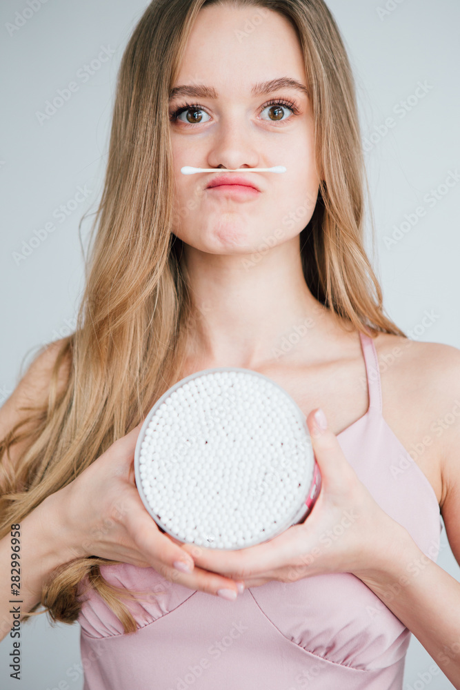 girl holding a jar of useful bamboo cotton buds girl holding a jar of useful bamboo cotton buds