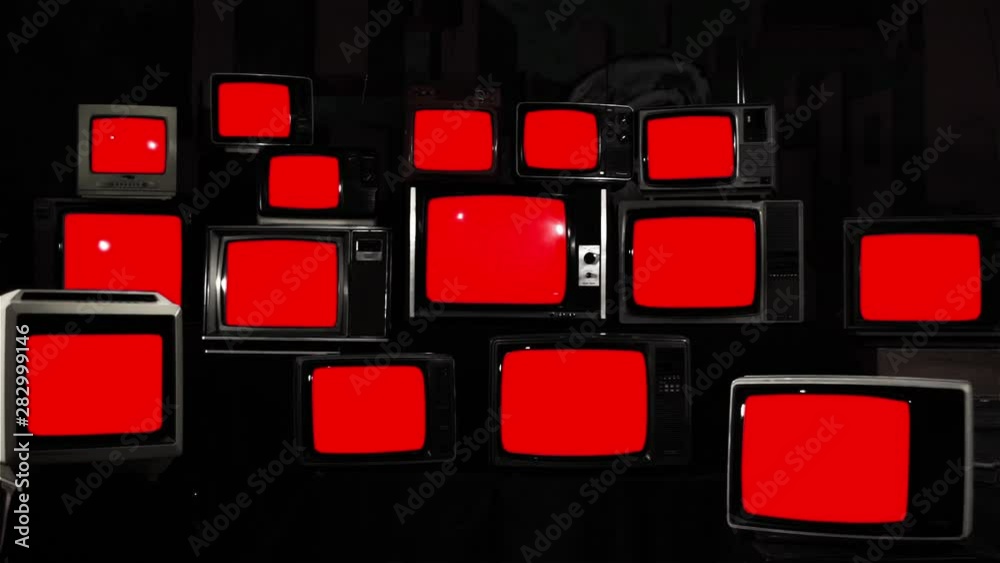 Stacked Vintage TVs Turning On And Off Red Screens. You can replace red