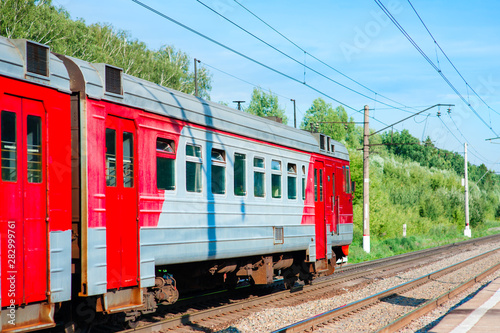 Electric train pulls up to the station platform