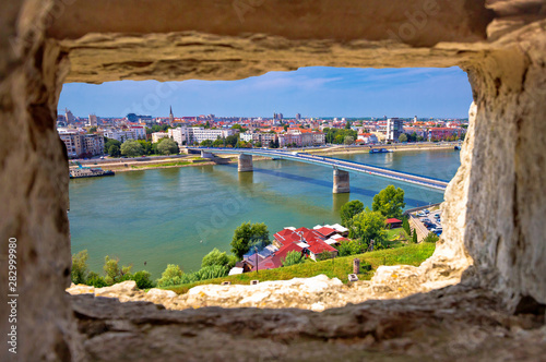 City Of Novi Sad and Danube river aerial view through stone window from Petrovaradin photo