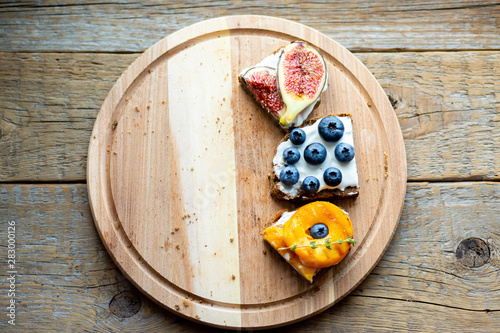  Bruschetta with berries Board Healthy breakfast Vegetarian food