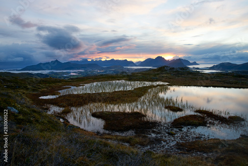 Sunset over mountains on Lofoten Islands in Norway photo