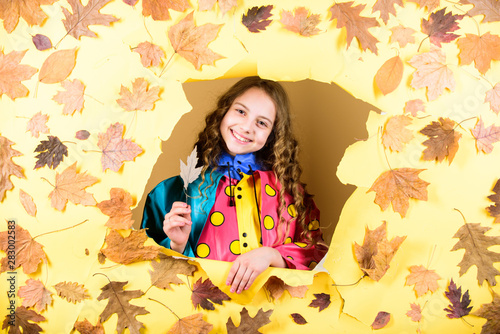 child in positive mood. season forecast. kid in autumn leaves. little girl in rain protection. Fall fashion. little girl in trendy raincoat. autumn beauty. Happy childhood. Autumn fashion