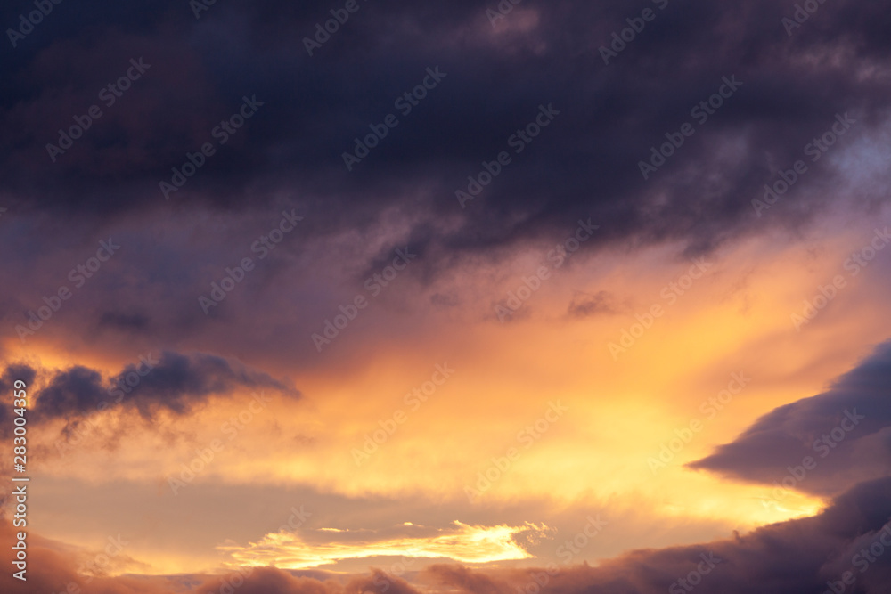 Sunset sky storm clouds billow nature background