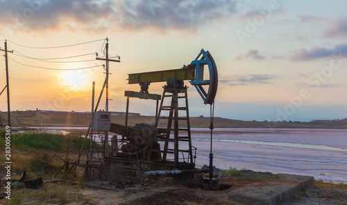 Oil rocking at sunset