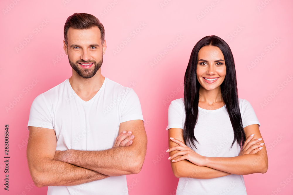 Fototapeta premium Portrait of his he her she two nice-looking attractive lovely charming cute cheerful cheery content spouses folded arms isolated over pink pastel background