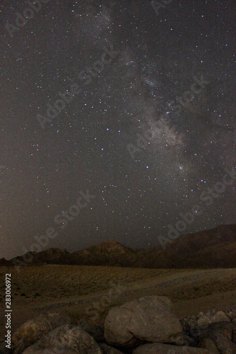 Milky way constellation in desert portrait