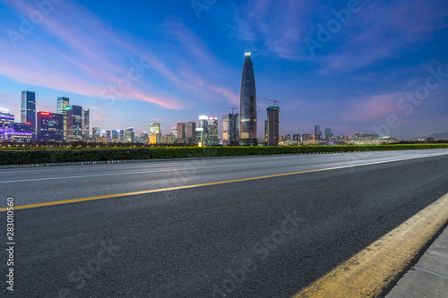 Fototapeta Naklejka Na Ścianę i Meble -  Empty asphalt road through modern city in Shenzhen, China