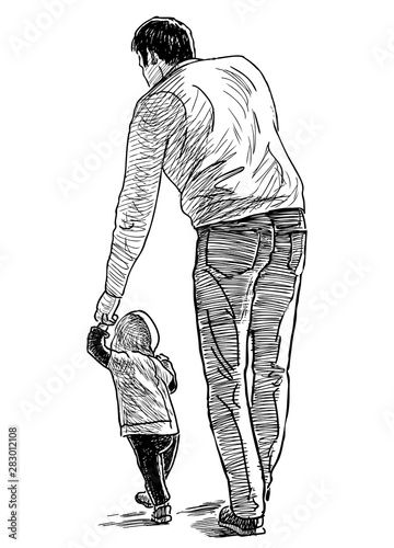 A young father with his baby going on a stroll