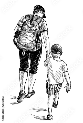 A young woman with a backpack and her little son going on a stroll