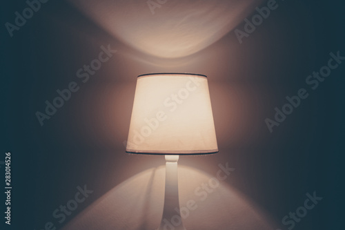 lamp on the wall. table lamp with warm light.