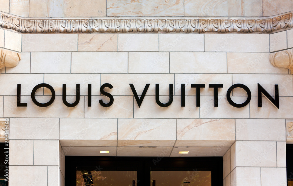 Düsseldorf, Germany - August 20, 2011: Louis Vuitton sign on the building  at Louis Vuitton store on Königsallee – Stock-Foto | Adobe Stock