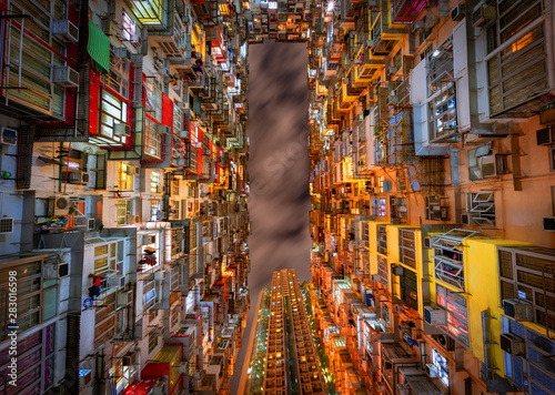 Canvas Print Colorful apartment building at Quarry Bay, Hong Kong, at Night.