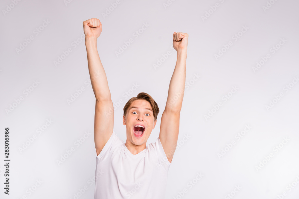 Photo of student guy in ecstatic weekend mood wear casual outfit isolated white background Photo of student guy in ecstatic weekend mood wear casual outfit isolated white background