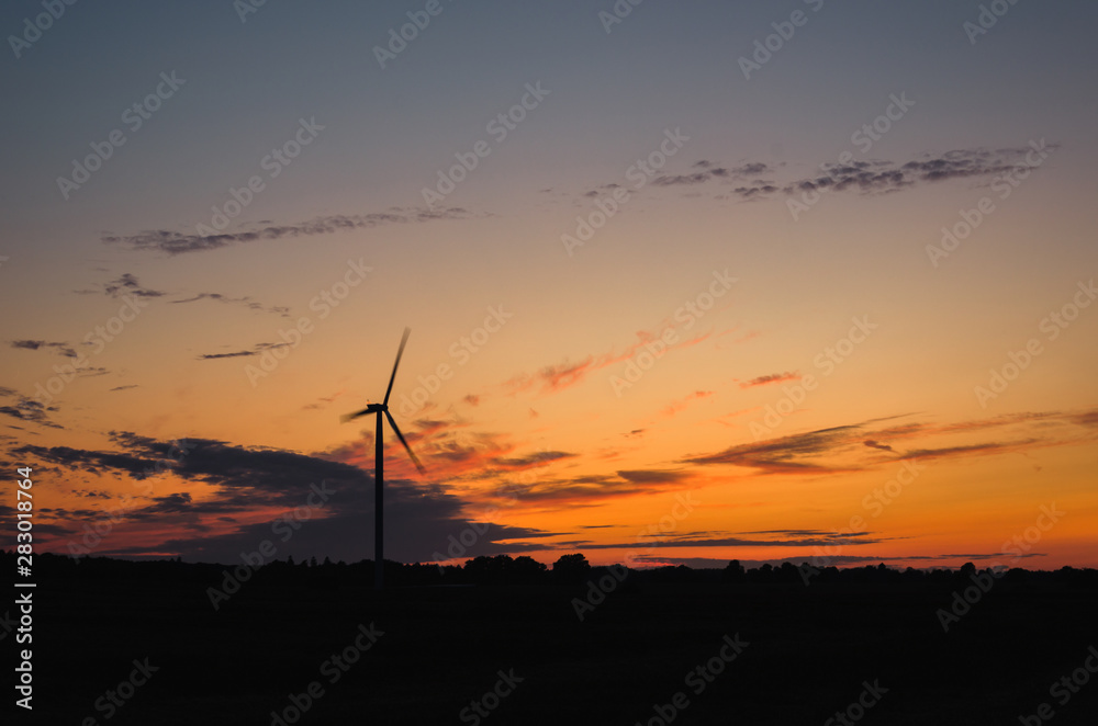 WIND FARM  - Hot evening landscape over the fields