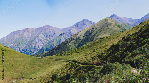 Panorama of a mountain valley in summer, aerial view. A fabulous view of the mountain peaks, amazing nature, summer in the mountains. Travel, tourism. beautiful background picture of nature