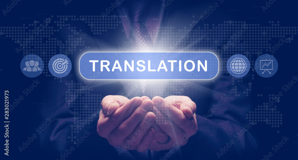 Businessmans cupped hands holding a Translation business concept on a computerised display.