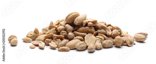 Mix of roasted, salted peanuts, cashew nuts and almonds isolated on white background