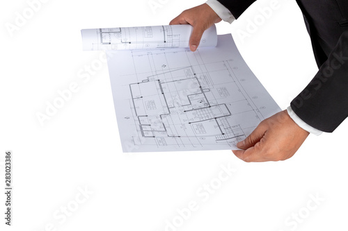 Businessman in the hand have a construction plan or architectural plan, Used for related professional house trading, real estate, construction.