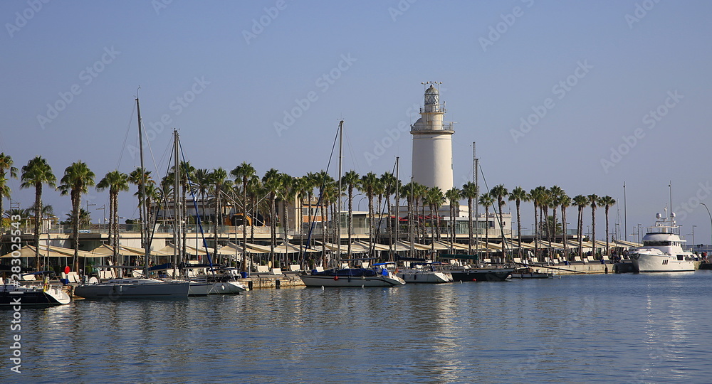 the lighthouse on the pier at Malaga Port, Spain