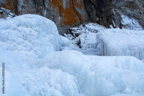 Rock cliff with ice in Lake Bikal, Russia, landscape photography