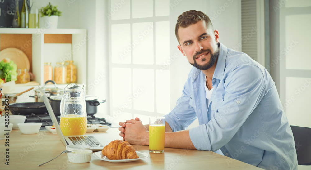 a business man breakfasts with notebook and juice a business man breakfasts with notebook and juice