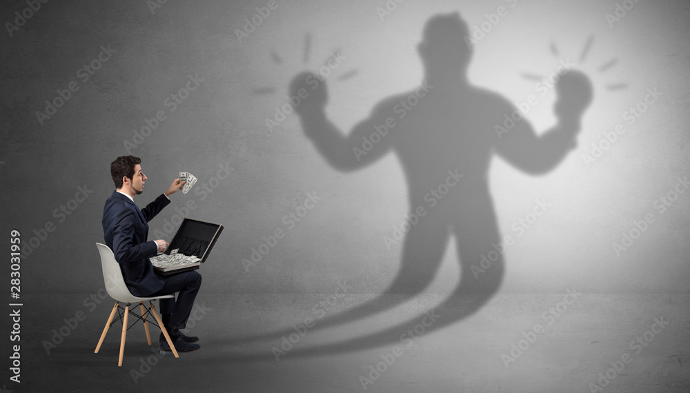 Businessman staying and offering stuffs to a shadow businessman Businessman staying and offering stuffs to a shadow businessman