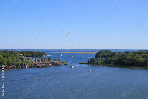 The bay of the holiday destination Roebel on Mueritz lake, Mecklenburg lake district, Germany photo