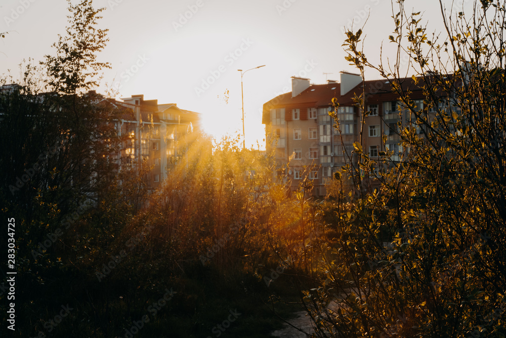 sunset in the city. Evening in the village. Sunny sunset. Townhouse in the suburbs. Evening walk. Sun. sunset in the city. Evening in the village. Sunny sunset. Townhouse in the suburbs. Evening walk. Sun.
