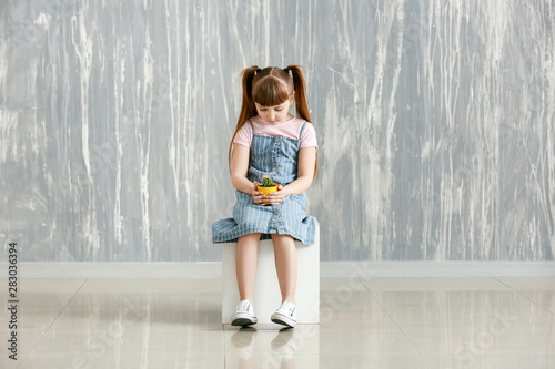 Sad little girl with autist...