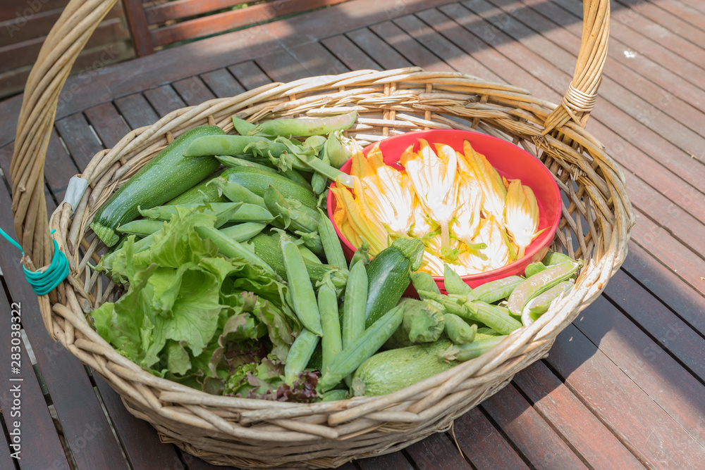 Basket with seasonal vegetables