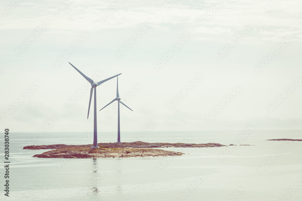 Wind turbines generator at Baltic Sea. Aland Islands, Finland. Europe.