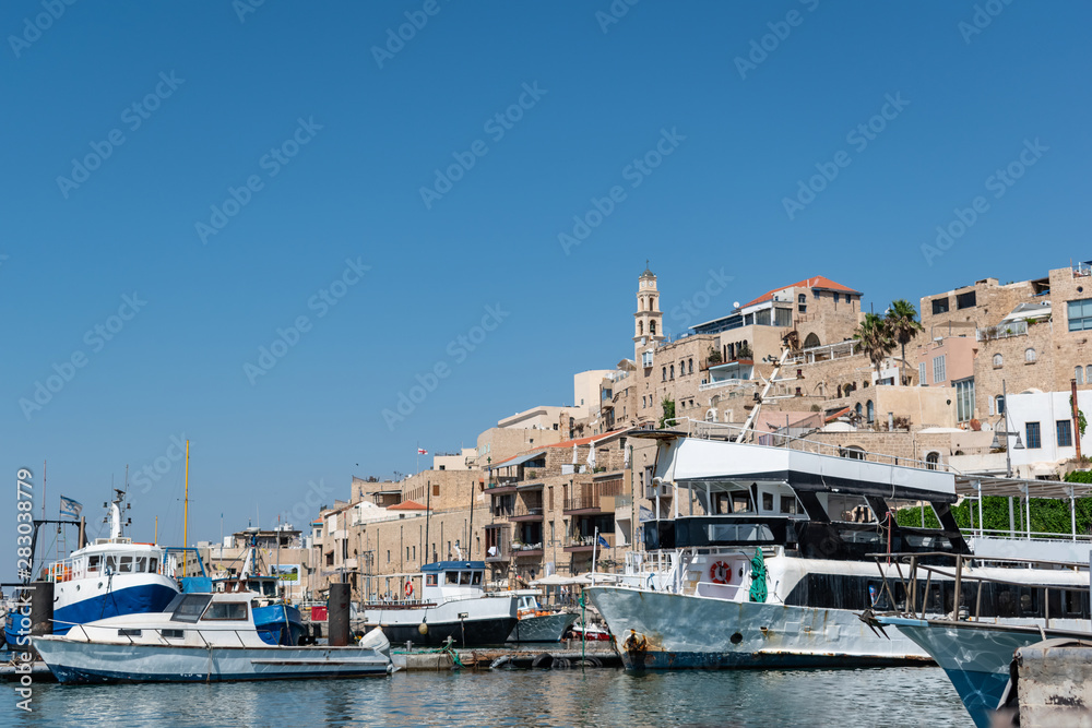 A picture view to Jaffa old city and an ancient harbor on a beautiful day