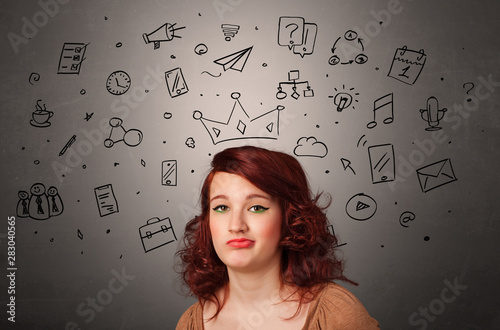 Pretty girl with drawn tasks above her head