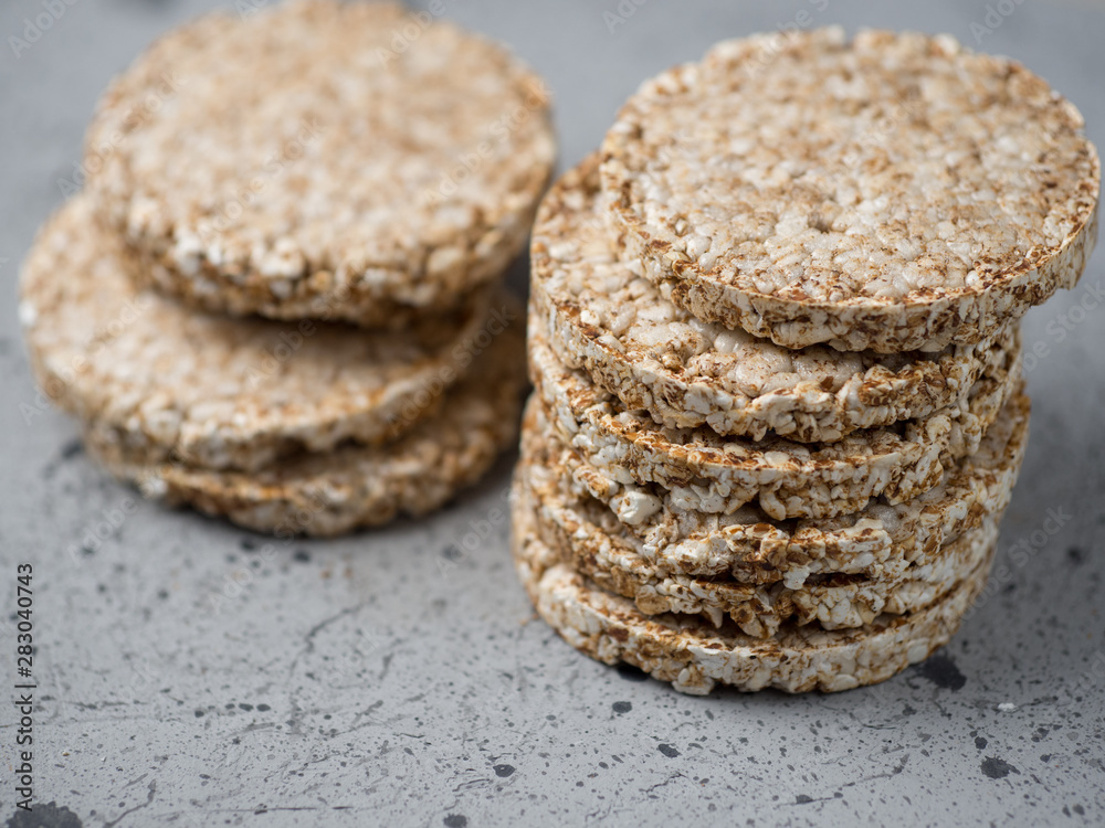 Rice and buckwheat cakes on the grey table Rice and buckwheat cakes on the grey table