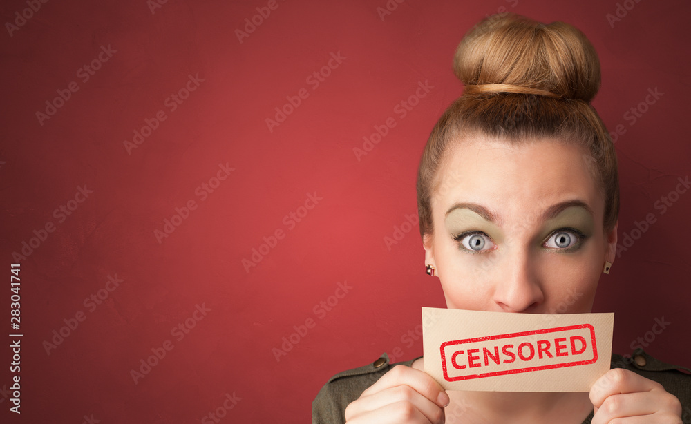 Young person holding adult content card in hand Young person holding adult content card in hand