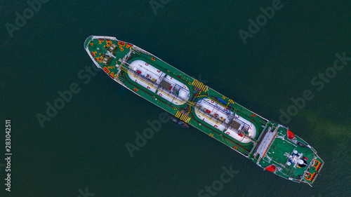 Aerial top view LPG tanker, Business logistic import and export oil and gas transportation. © Kalyakan