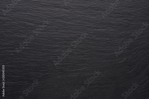Black stone tile texture. Empty black surface with copy space