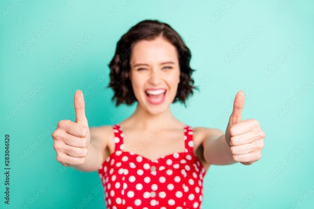 Photo of nice overjoyed enjoying girl having achieved all set aims and now only thing left for her to do is enjoying life while isolated with teal background Photo of nice overjoyed enjoying girl having achieved all set aims and now only thing left for her to do is enjoying life while isolated with teal background