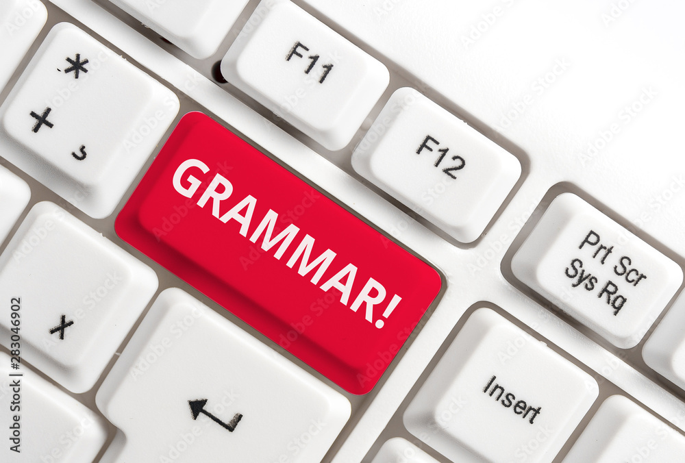 Word writing text Grammar. Business photo showcasing whole system structure language syntax and morphology White pc keyboard with empty note paper above white background key copy space Word writing text Grammar. Business photo showcasing whole system structure language syntax and morphology White pc keyboard with empty note paper above white background key copy space