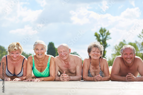 Group of happy seniors in the sun