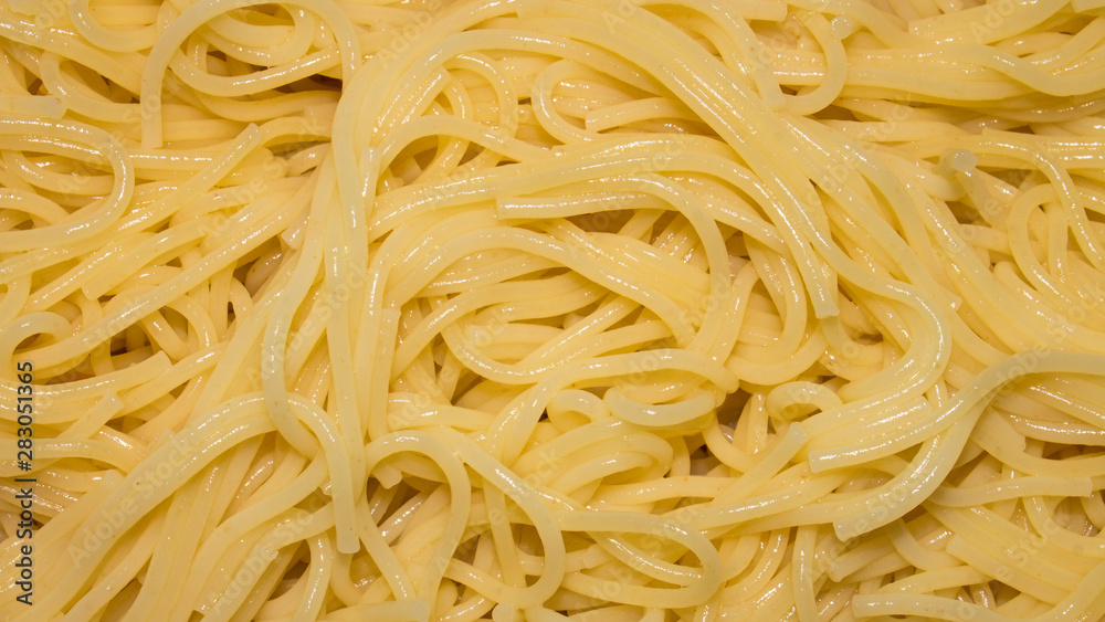 Pasta background.Spaghetti texture.Vermicelli background.The texture of the noodles. Pasta background.Spaghetti texture.Vermicelli background.The texture of the noodles.