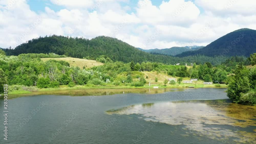 Croatia, Gorski kotar, drone flight over the green shore of the beautiful lake Mrzla Vodica Croatia, Gorski kotar, drone flight over the green shore of the beautiful lake Mrzla Vodica