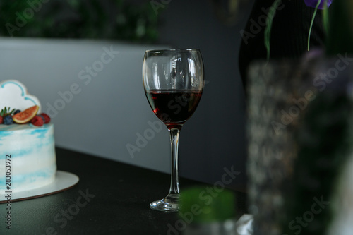 a glass of red wine at home cooking