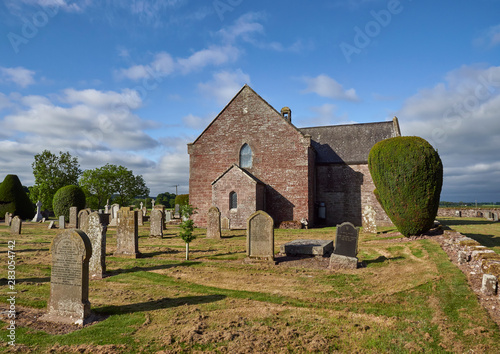 An end on View of Stracathro Parish Church situated in a Valley of arable farmland in Stracathro, Angus, Scotland.