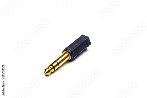 gold audio adapter isoalted on white background.