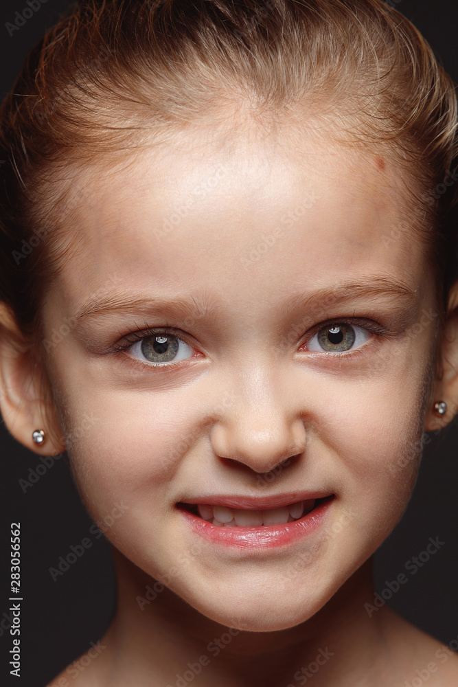 Close up portrait of little and emotional caucasian girl. Highly detail photoshot of female model with well-kept skin and bright facial expression. Concept of human emotions. Angry, agressive. Close up portrait of little and emotional caucasian girl. Highly detail photoshot of female model with well-kept skin and bright facial expression. Concept of human emotions. Angry, agressive.