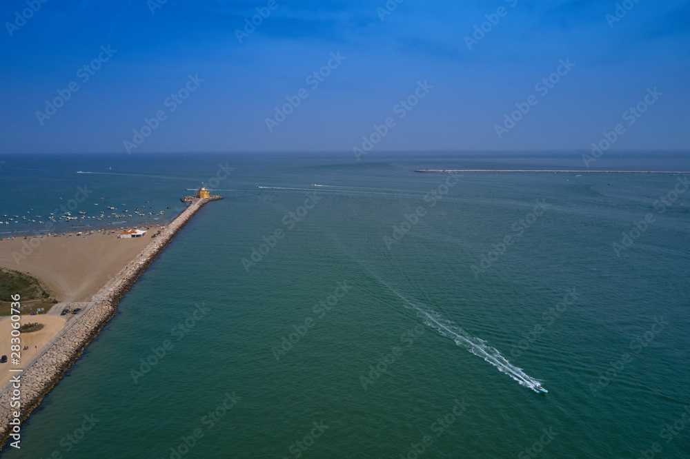 Aerial view lighthouse Punta Sabbioni Leuchtturm entrance in Venice, Italy. The main lighthouse at the entrance to the city of Venice. Resorts of Venice. Tourist place.
