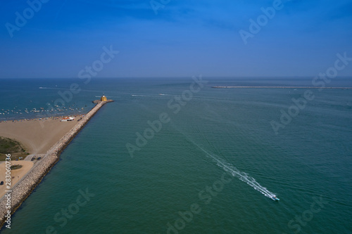 Aerial view lighthouse Punta Sabbioni Leuchtturm entrance in Venice, Italy. The main lighthouse at the entrance to the city of Venice. Resorts of Venice. Tourist place.