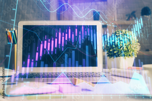 Double exposure of forex chart and work space with computer. Concept of international online trading. © peshkova